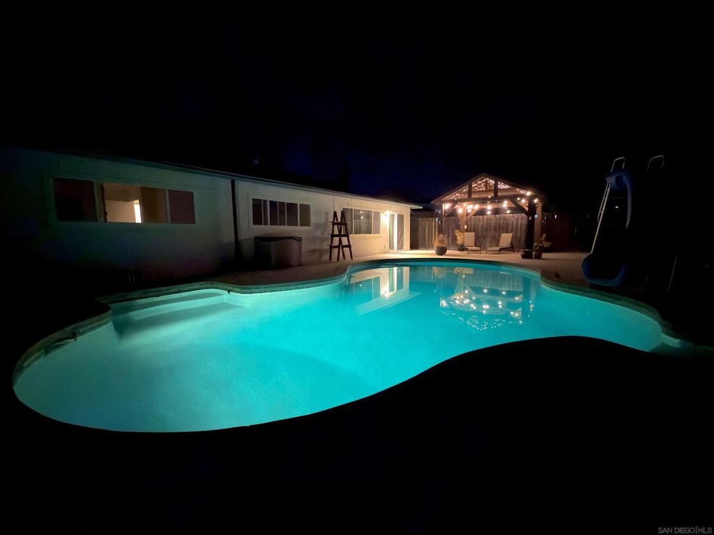 Photo of 10025 Tamil Rd, Lakeside, CA 92040 (MLS # 250041703)