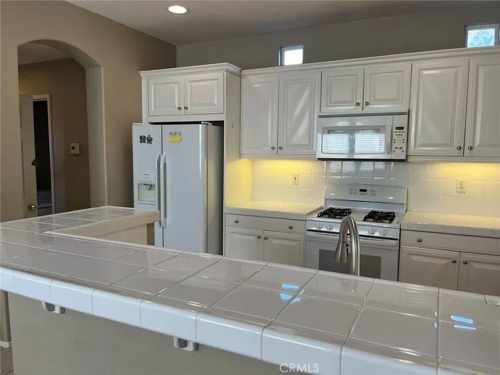Photo of 8 Pearleaf, Irvine, CA 92618 (MLS # OC26110748)