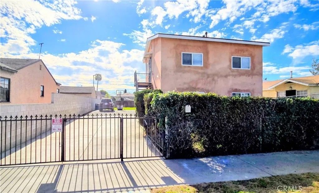 Photo of 1342 E 77th Place, Los Angeles, CA 90001 (MLS # PW26020056)