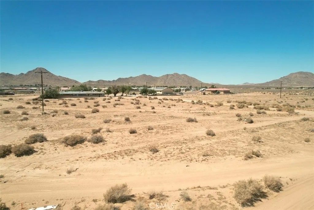 Photo of 23 Wigwam, Apple Valley, CA 92307 (MLS # CV26055679)