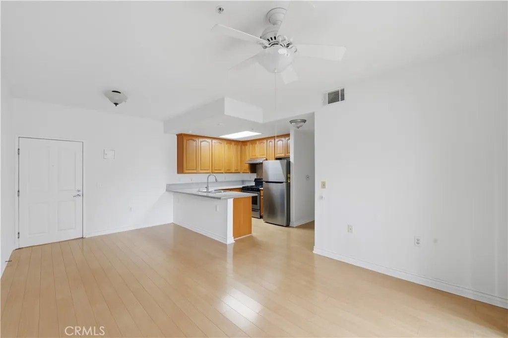 Photo of 17888 Alburtis Avenue #B112, Artesia, CA 90701 (MLS # RS26070092)