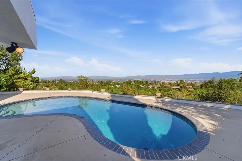 Photo of 3329 Dona Rosa Dr, Studio City, CA 91604 (MLS # SR26042051)