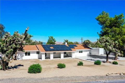 Photo of 56800 Java Drive, Yucca Valley, CA 92284 (MLS # OC25275036)