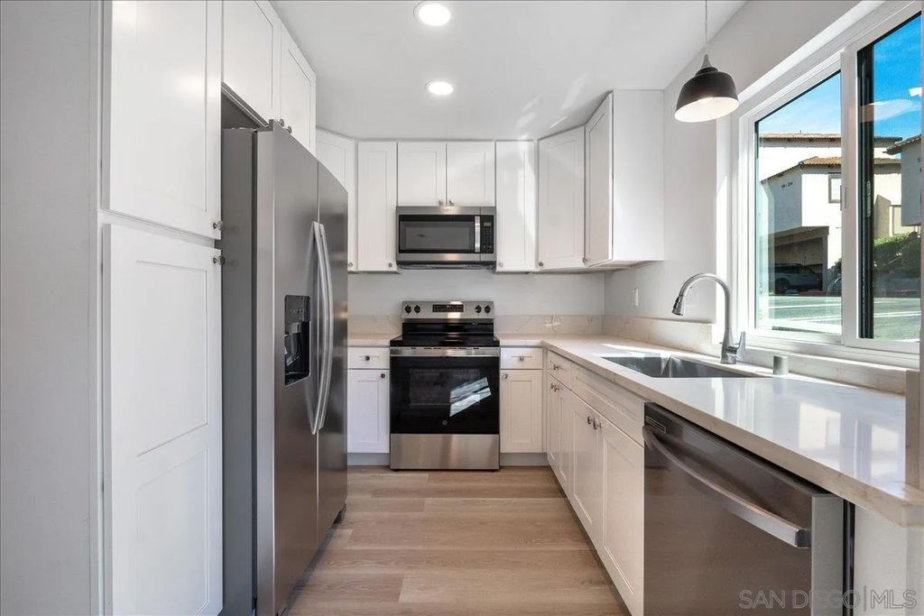 Photo of 955 Postal Way #29, Vista, CA 92083 (MLS # 260009851)