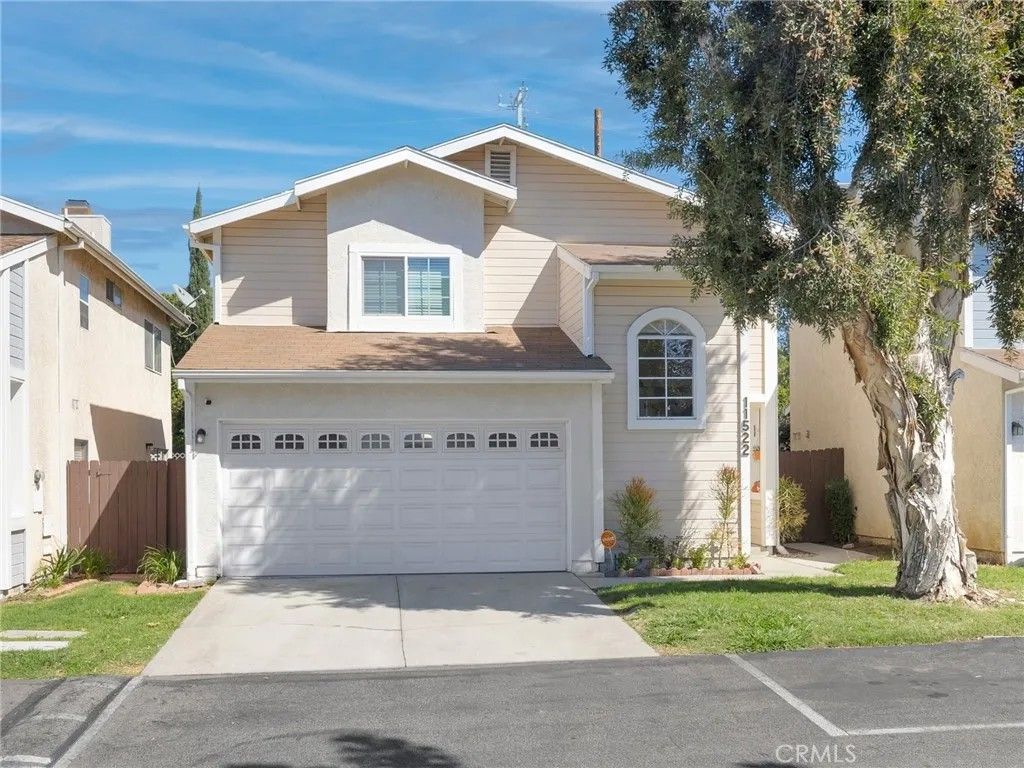 Photo of 11522 Honeyglen Road #26, Pacoima, CA 91331 (MLS # AR26043536)