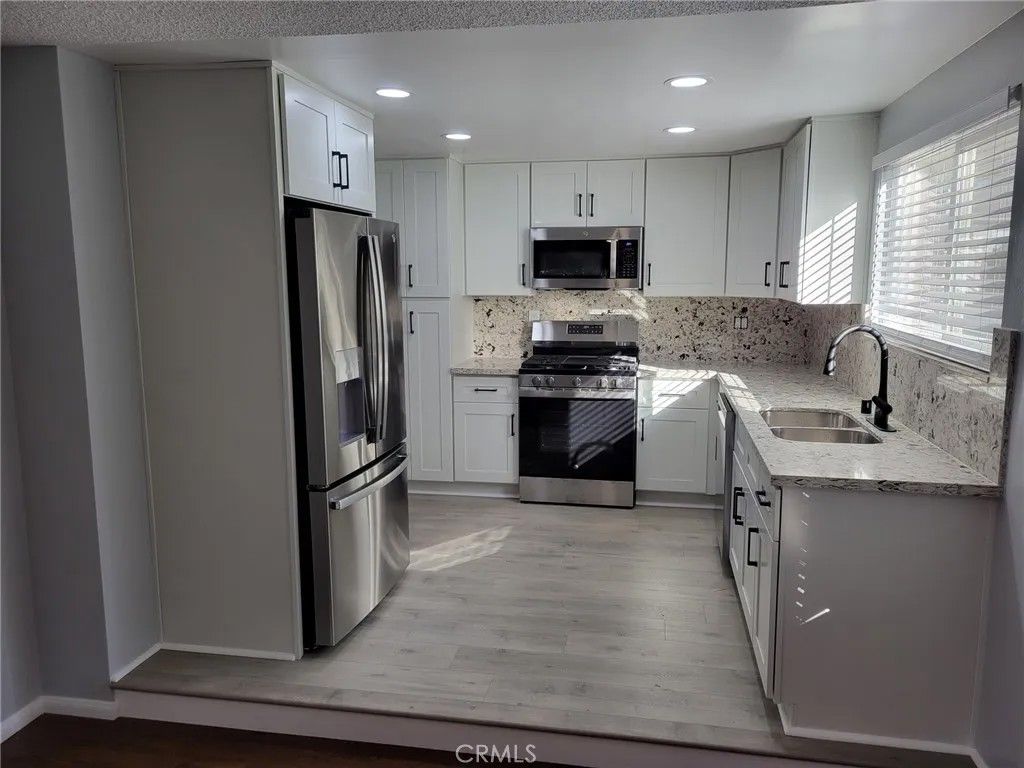 Photo of 8417 Joan Lane, West Hills, CA 91304 (MLS # SR25275898)