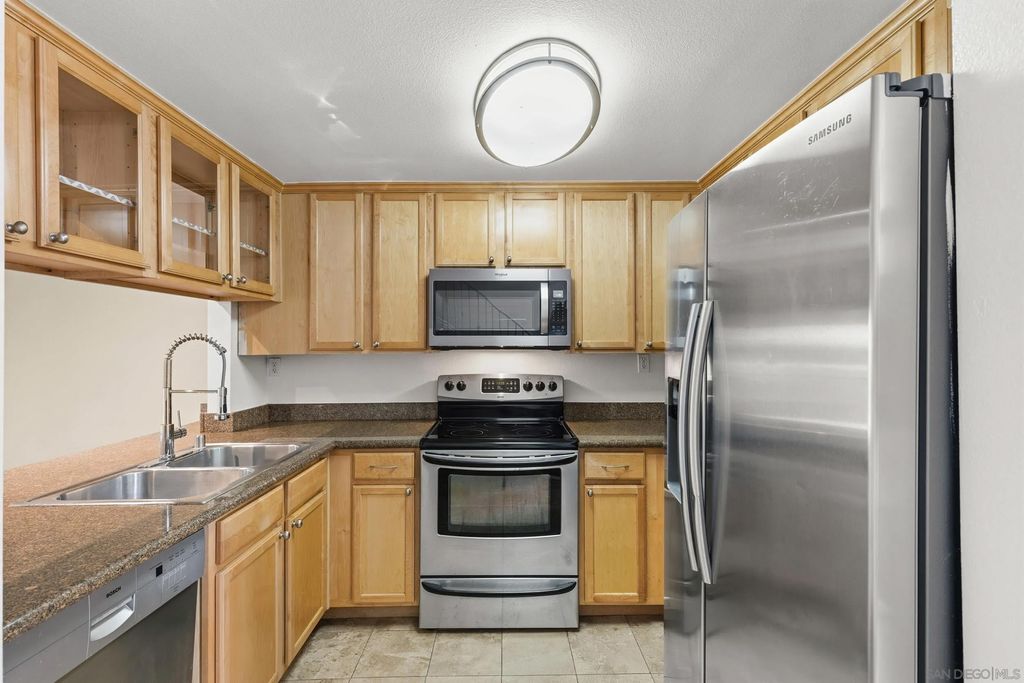 Photo of 10224 Maya Linda Road #17, San Diego, CA 92126 (MLS # 2600511)