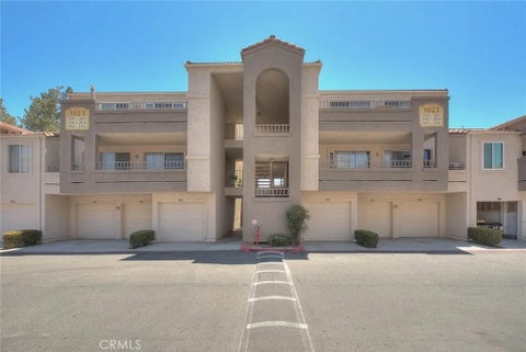 Photo of 1023 Vista Del Cerro DR #302, Corona, CA 92879 (MLS # CV26137625)