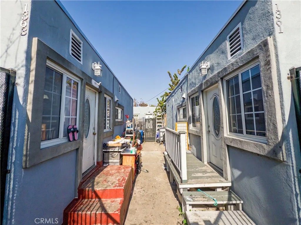 Photo of 1361 W Vernon Avenue, Los Angeles, CA 90037 (MLS # MB26023686)