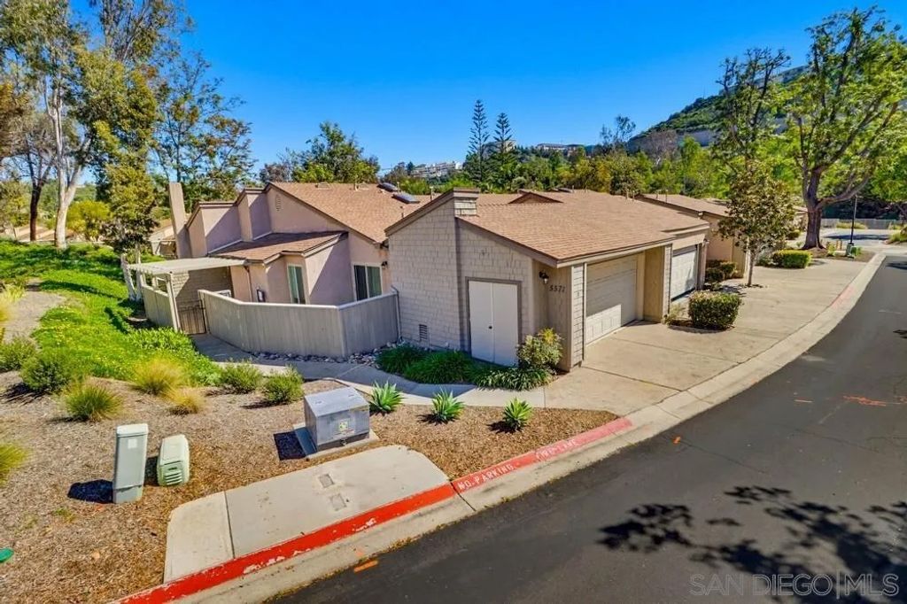 Photo of 5571 Adobe Falls Rd #D, San Diego, CA 92120 (MLS # 260004433)