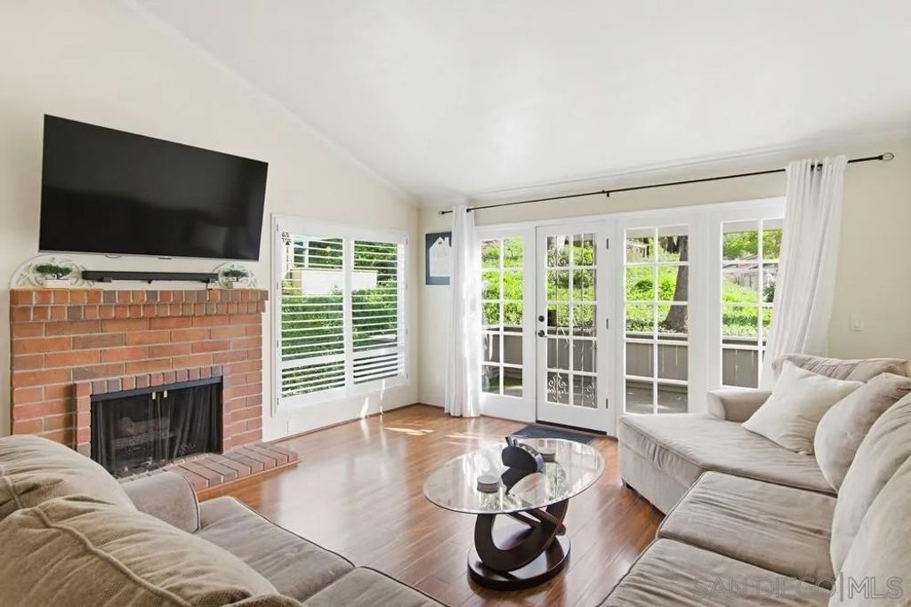 Photo of 5571 Adobe Falls Rd #D, San Diego, CA 92120 (MLS # 260004433)