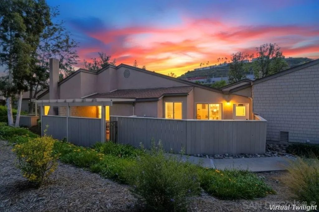 Photo of 5571 Adobe Falls Rd #D, San Diego, CA 92120 (MLS # 260004433)