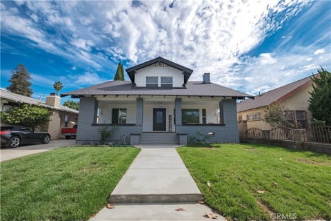 Photo of 1758 W 41st PL, Los Angeles, CA 90062 (MLS # DW26200814)