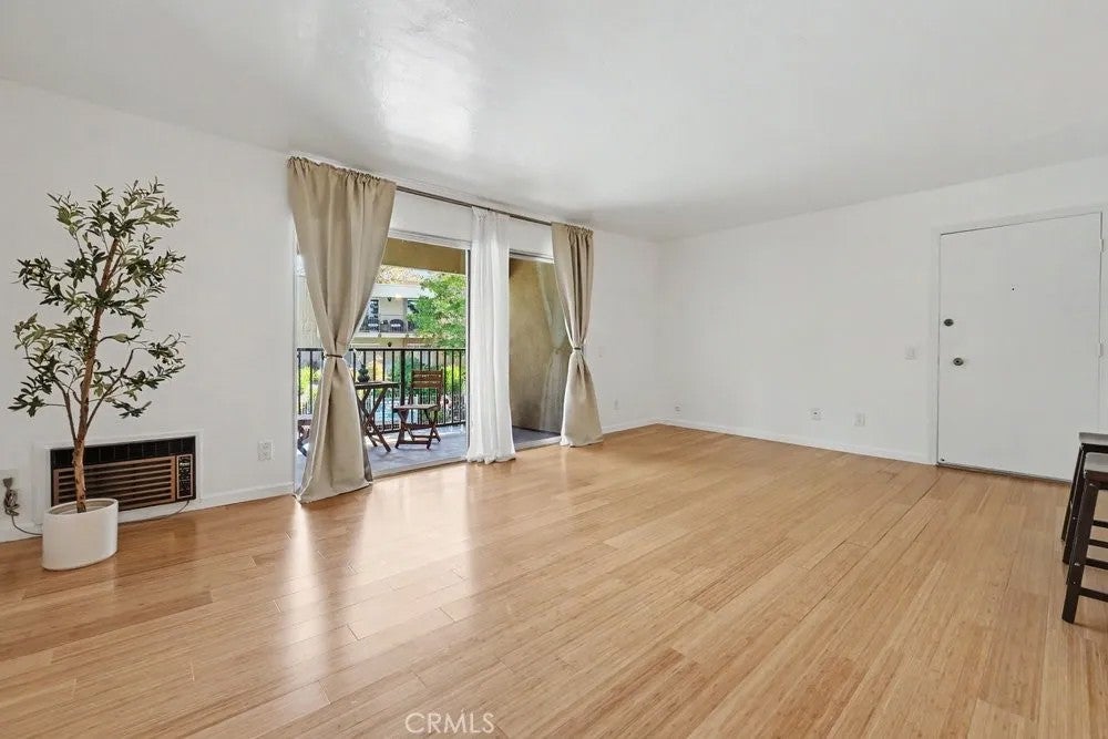 Photo of 5700 Baltimore DR #106, La Mesa, CA 91942 (MLS # OC26185767)
