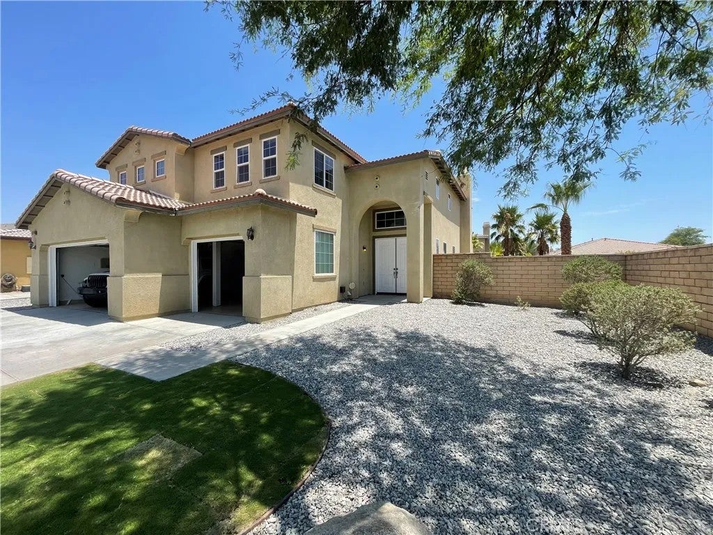 Photo of 37222 Camden Dr, Indio, CA 92203 (MLS # GD26211951)