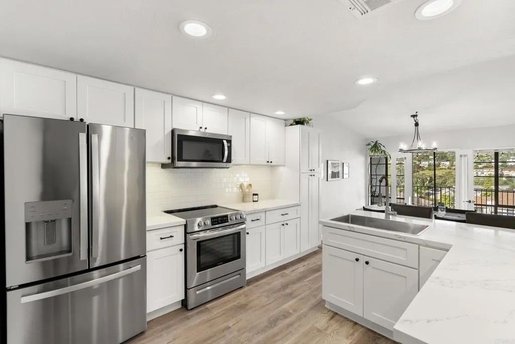 Photo of 2630 Pirineos Way #13, Carlsbad, CA 92009 (MLS # NDP2604091)