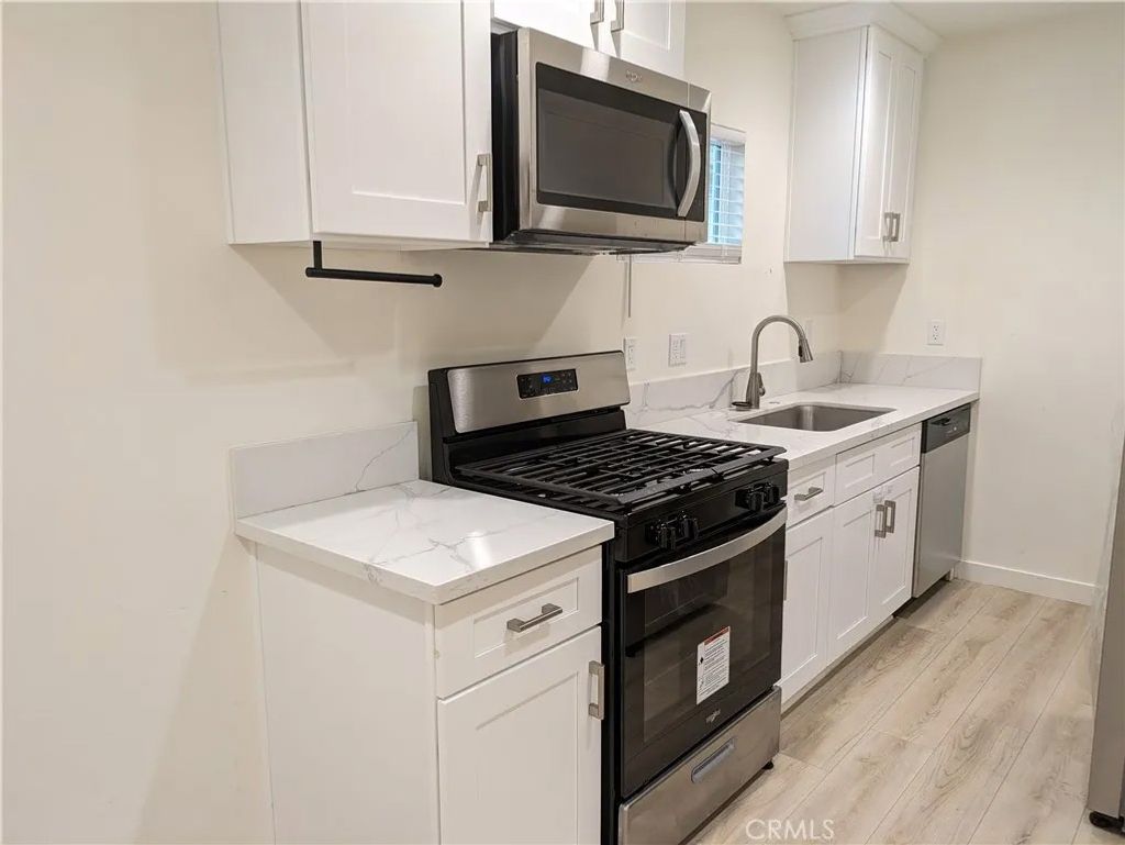 Photo of 200 E Phillips St #202, Ontario, CA 91761 (MLS # TR26001433)