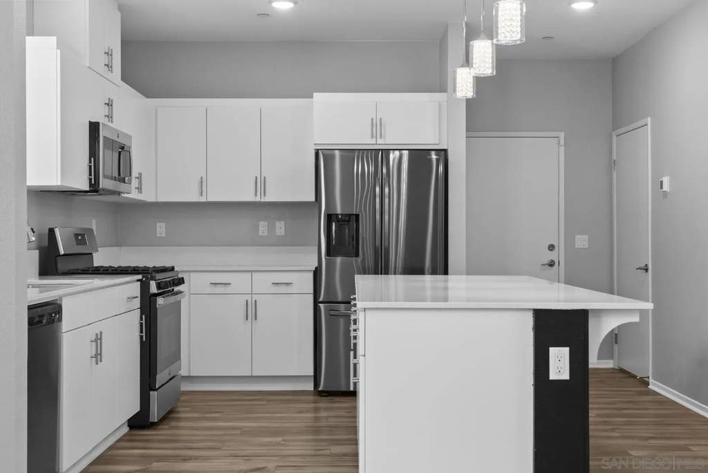 Photo of 5223 Surfwalk Way #111, San Diego, CA 92154 (MLS # 260017909)