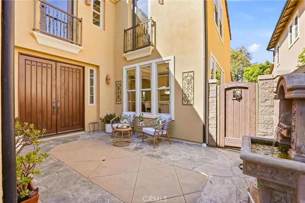 Photo of 57 Sweet Bay, Irvine, CA 92603 (MLS # OC26061748)