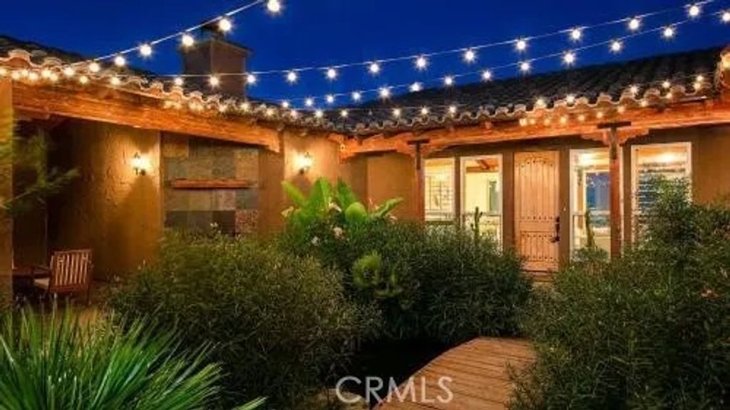 Photo of 7529 Rockaway Avenue, Yucca Valley, CA 92284 (MLS # JT26020363)