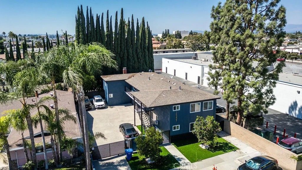 Photo of 11221 Pangborn Avenue, Downey, CA 90241 (MLS # DW25276595)