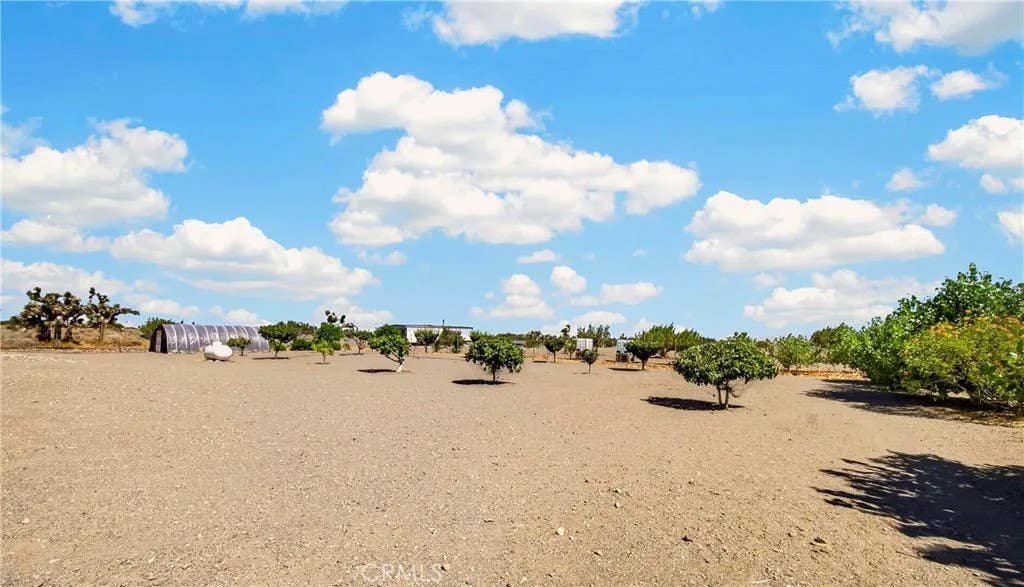Photo of 10624 Nugget RD, Phelan, CA 92371 (MLS # PW26151774)