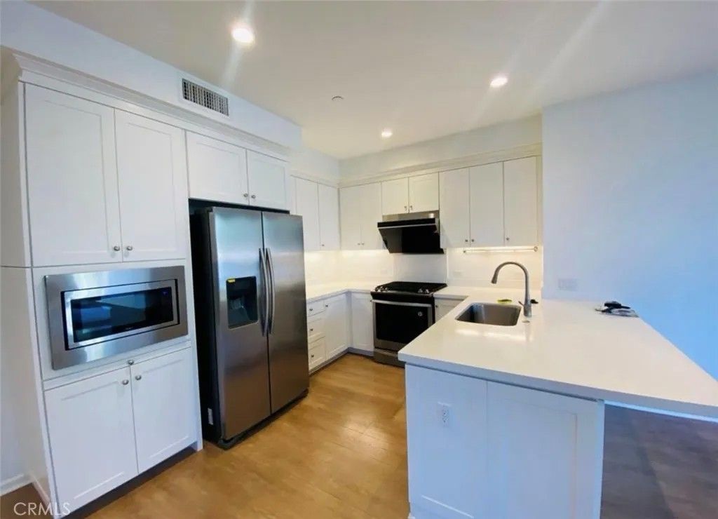 Photo of 146 Damsel, Irvine, CA 92620 (MLS # OC26086477)