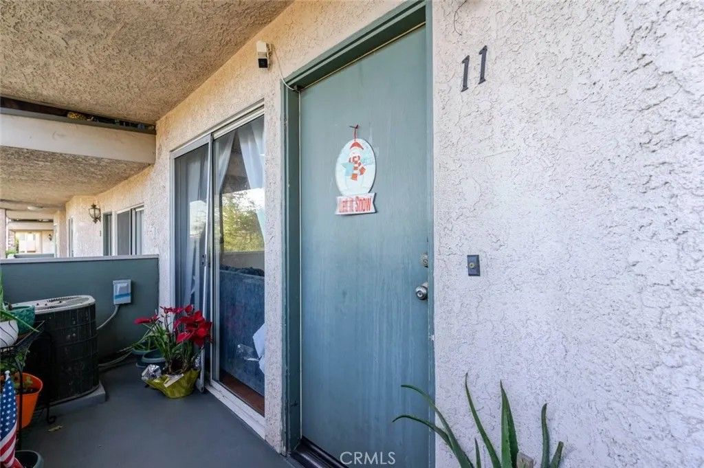 Photo of 13100 Bromont Avenue #11, Sylmar, CA 91342 (MLS # SR26005211)