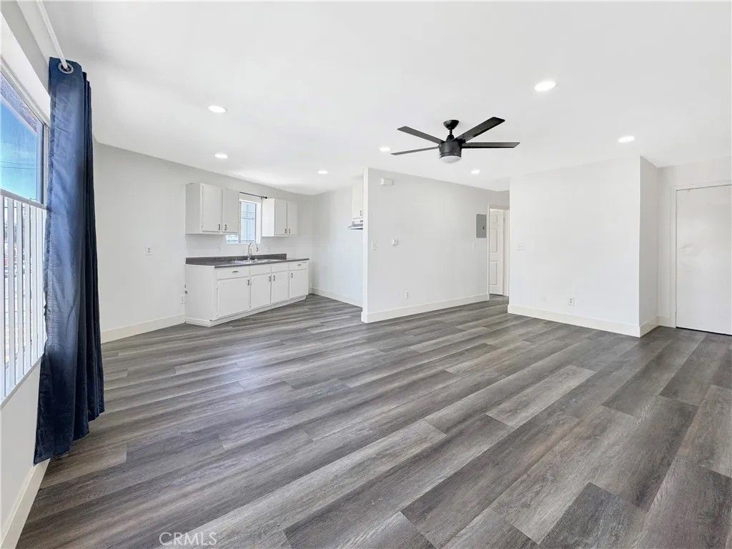 Photo of 1400 W 65th Pl, Los Angeles, CA 90047 (MLS # MB26087048)