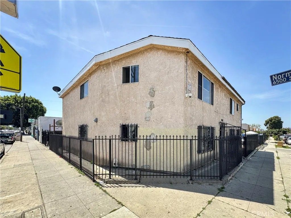Photo of 1400 W 65th Pl, Los Angeles, CA 90047 (MLS # MB26087048)