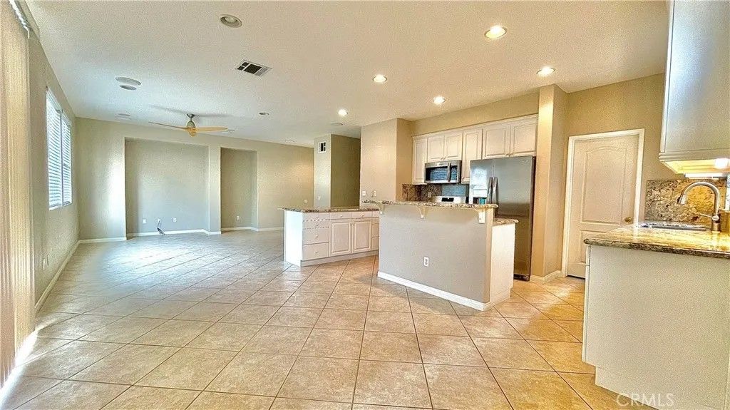 Photo of 17543 Nutwood Dr, Carson, CA 90746 (MLS # CV26001699)