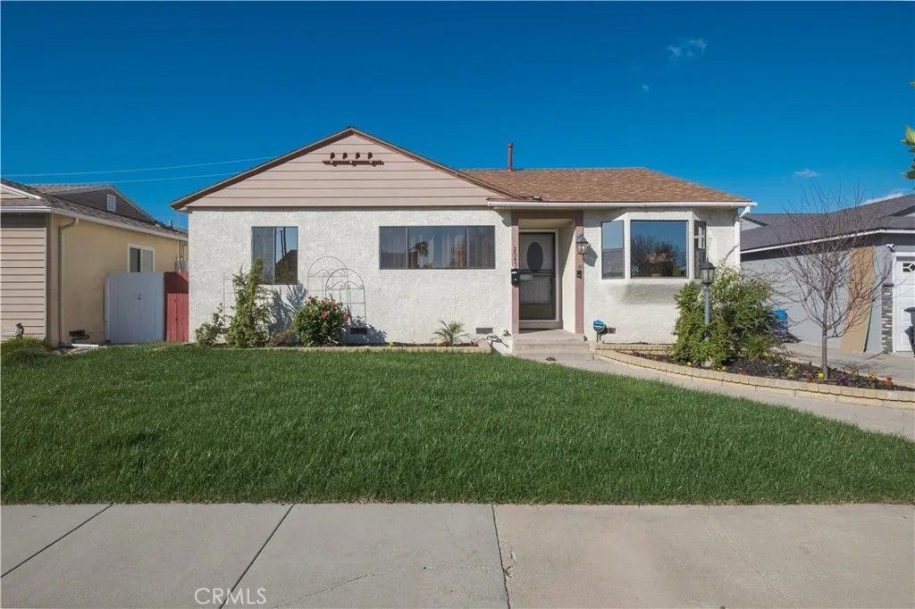 Photo of 2545 Loomis St, Lakewood, CA 90712 (MLS # DW26037924)