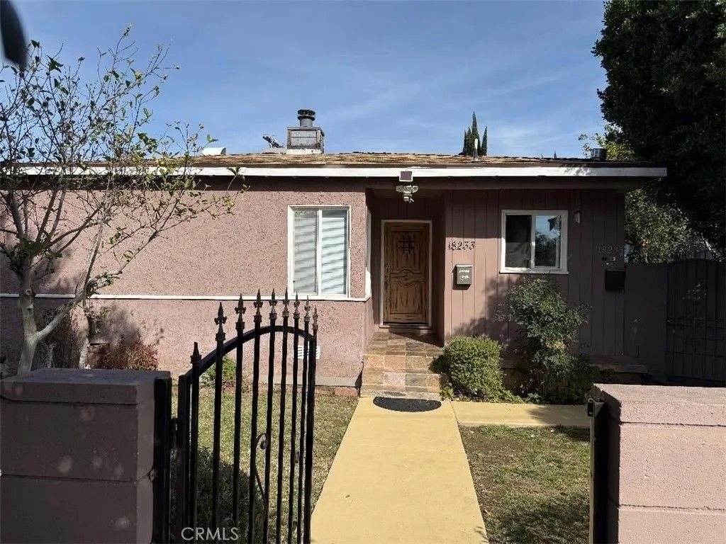 Photo of 18233 Welby Way, Reseda, CA 91335 (MLS # SR25280858)