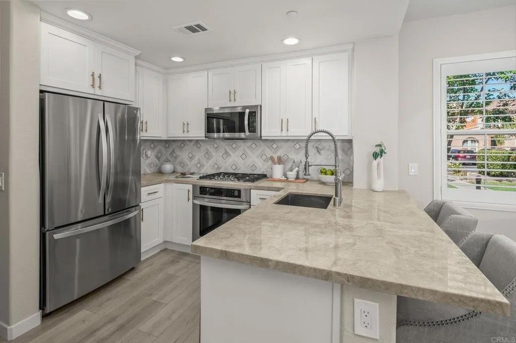 Photo of 17023 Calle Trevino #2, San Diego, CA 92127 (MLS # PTP2600894)