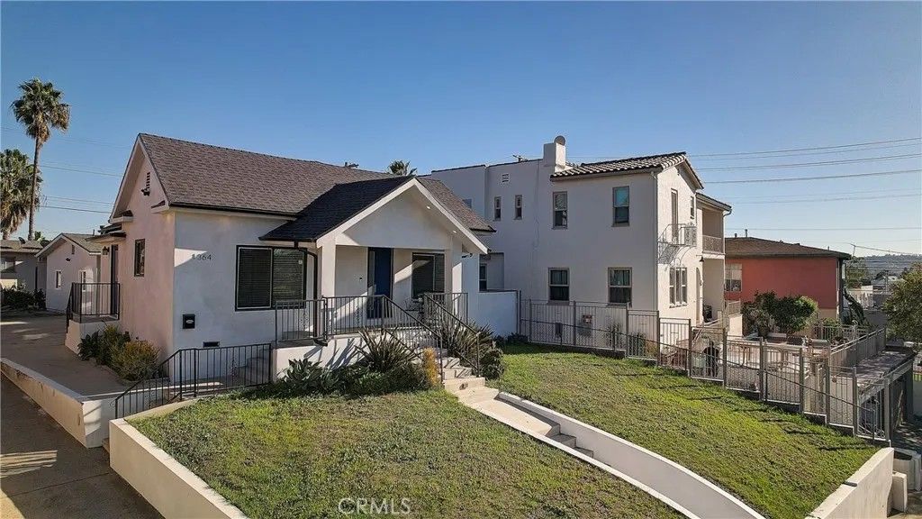 Photo of 1364 S Ridgeley Dr, Los Angeles, CA 90019 (MLS # SR25277859)