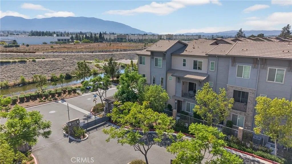 Photo of 893 Tangelo Way #103, Corona, CA 92878 (MLS # IG25198943)