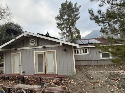 Photo of 528 Stream Ln, Lytle Creek, CA 92358 (MLS # CV26028335)