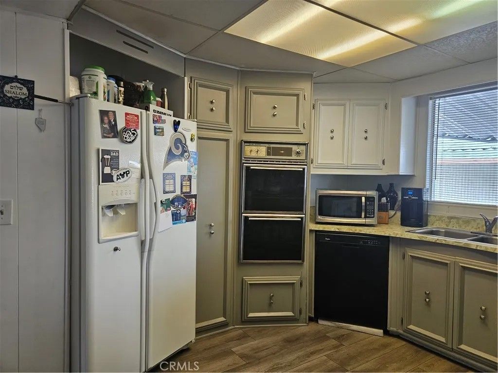 Photo of 1327 Woodbrook, Corona, CA 92882 (MLS # IG25280042)