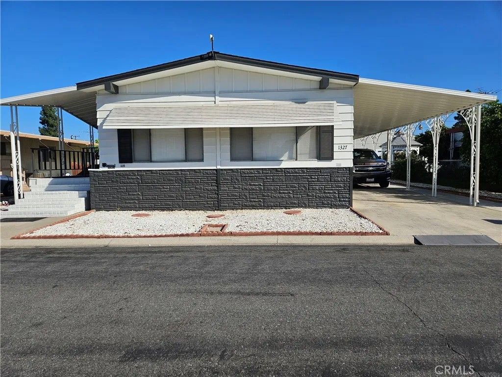 Photo of 1327 Woodbrook, Corona, CA 92882 (MLS # IG25280042)