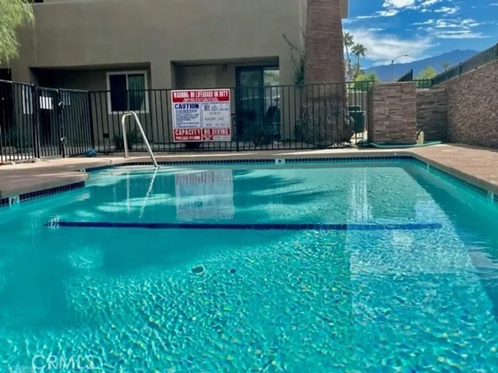 Photo of 44220 San Pablo Avenue #4, Palm Desert, CA 92260 (MLS # NP25278020)