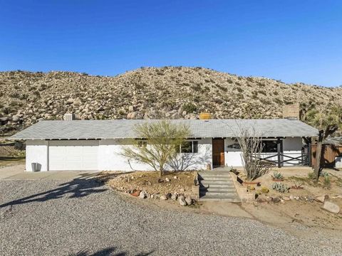 Photo of 56608 Sunnyslope Dr, Yucca Valley, CA 92284 (MLS # PTP2600087)