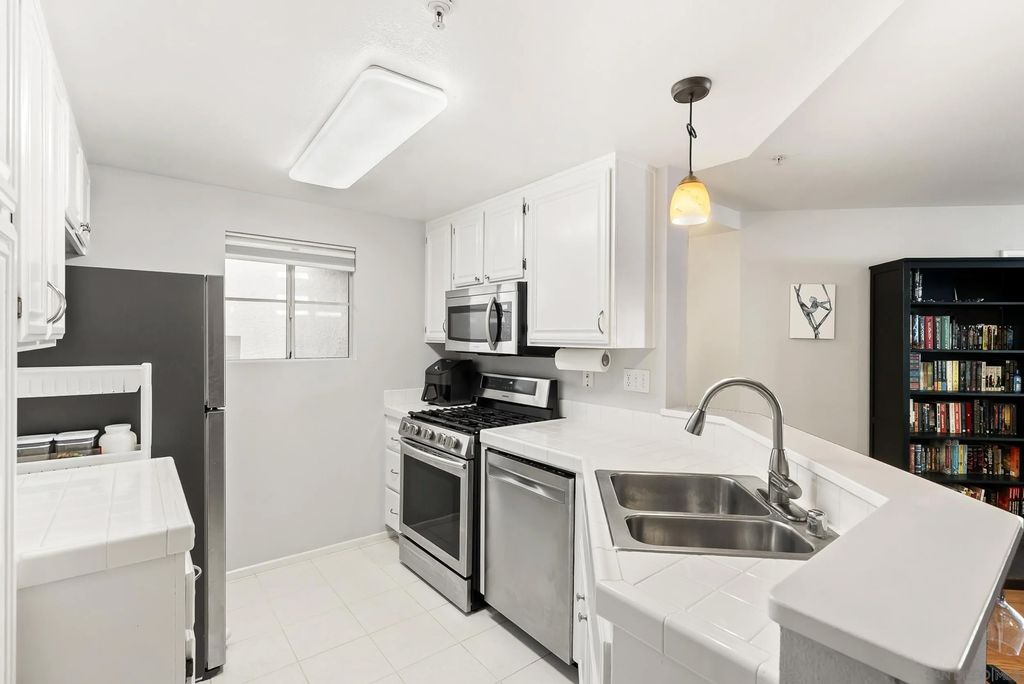 Photo of 11375 Affinity Ct #207, San Diego, CA 92131 (MLS # 260007805)