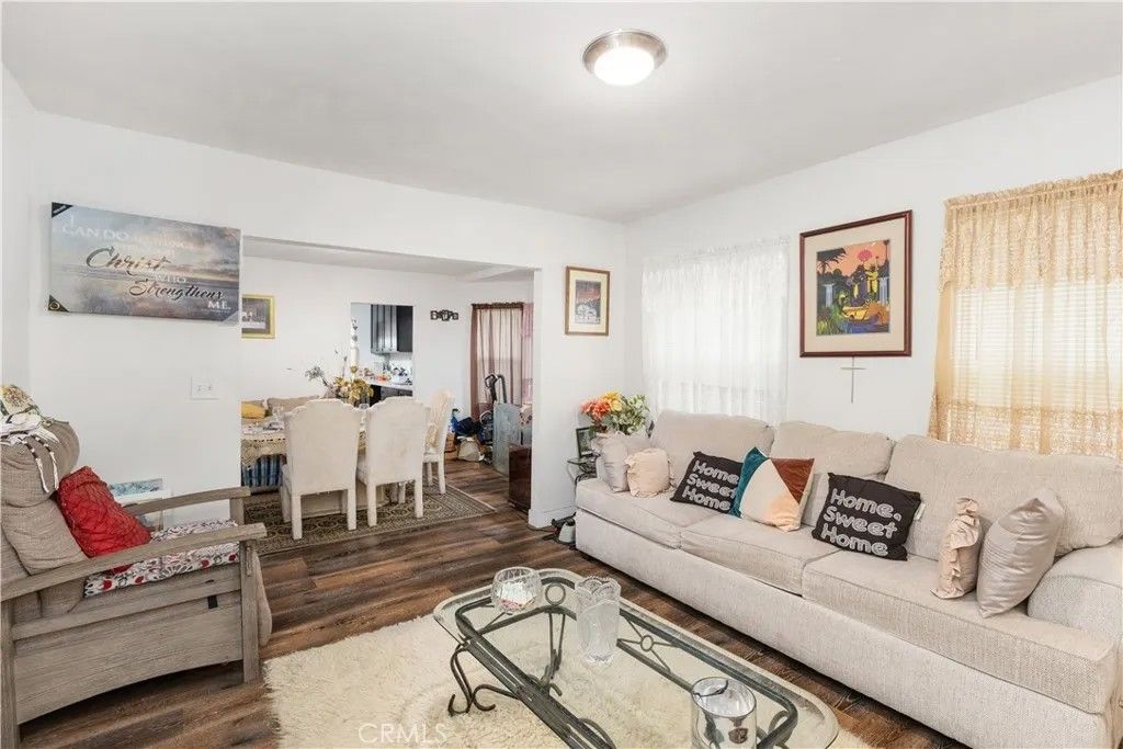 Photo of 1301 W 60th Place, Los Angeles, CA 90044 (MLS # OC26089769)