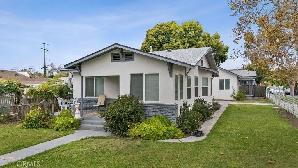 Photo of 1301 W 60th Place, Los Angeles, CA 90044 (MLS # OC26089769)