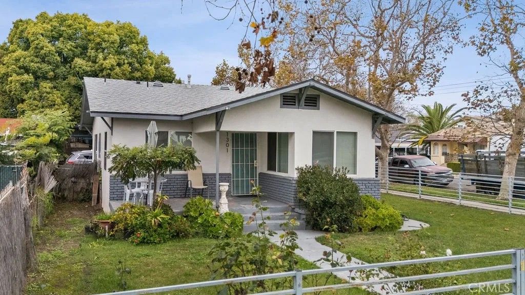 Photo of 1301 W 60th Place, Los Angeles, CA 90044 (MLS # OC26089769)