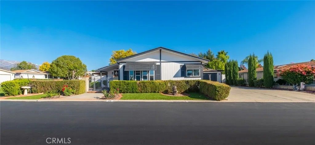 Photo of 10961 Desert Lawn Dr #86, Calimesa, CA 92320 (MLS # CV25267327)