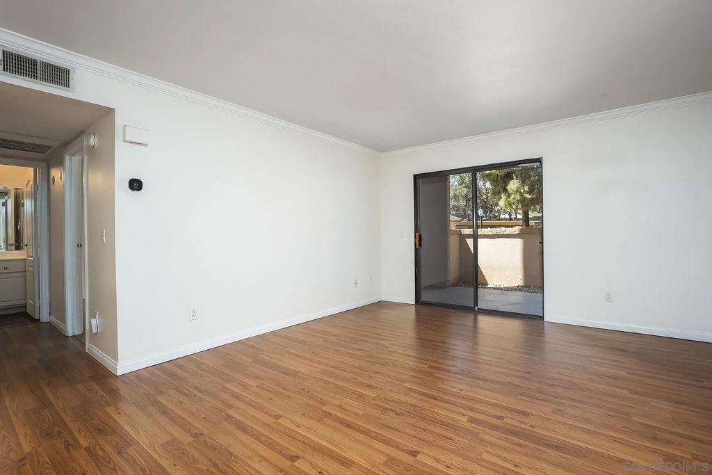 Photo of 12015 Alta Carmel Ct #306, San Diego, CA 92128 (MLS # 260007936)