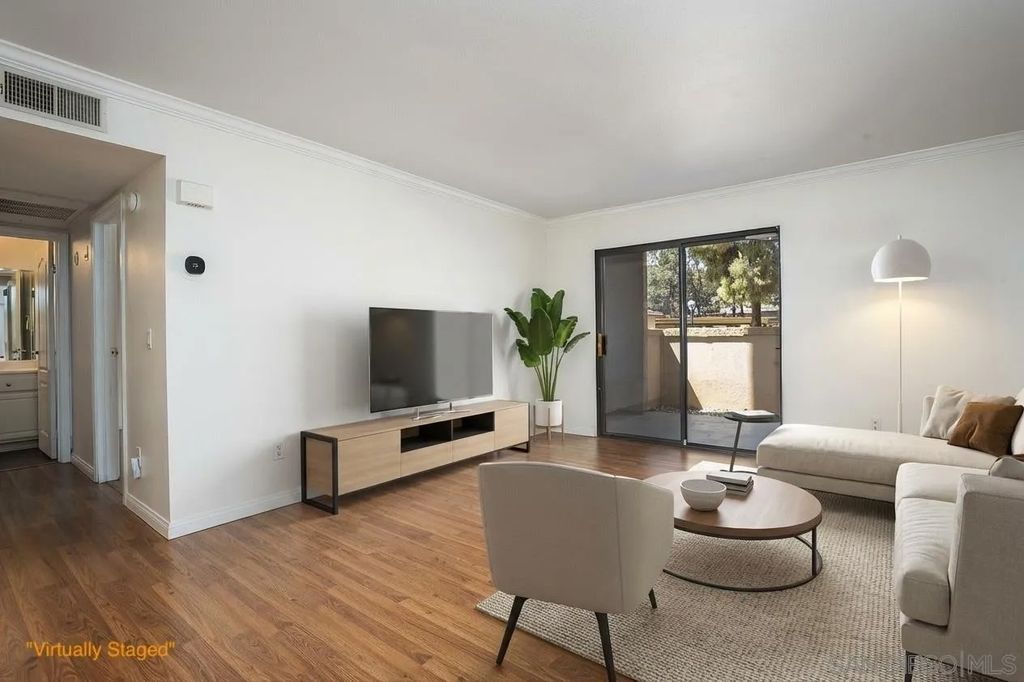 Photo of 12015 Alta Carmel Ct #306, San Diego, CA 92128 (MLS # 260007936)