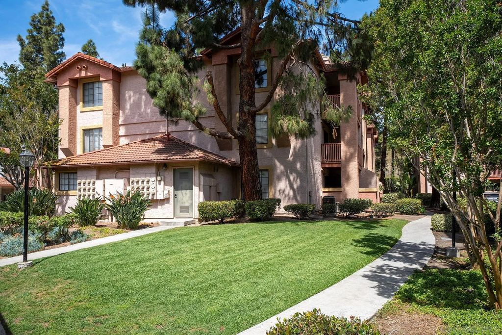 Photo of 12015 Alta Carmel Ct #306, San Diego, CA 92128 (MLS # 260007936)