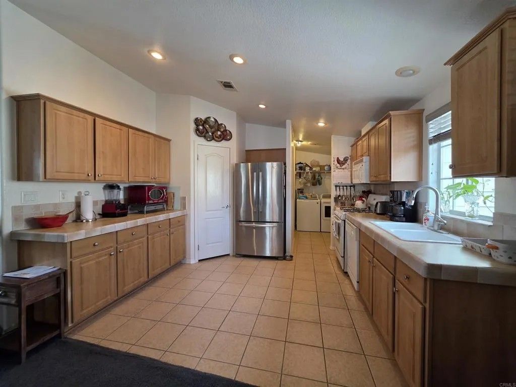 Photo of 450 E Bradley Ave #SPC 144, El Cajon, CA 92021 (MLS # PTP2502036)